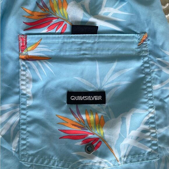 Quiksilver Blue and Orange Swim Trunks with Tropical Floral Design - Picture 4 of 7